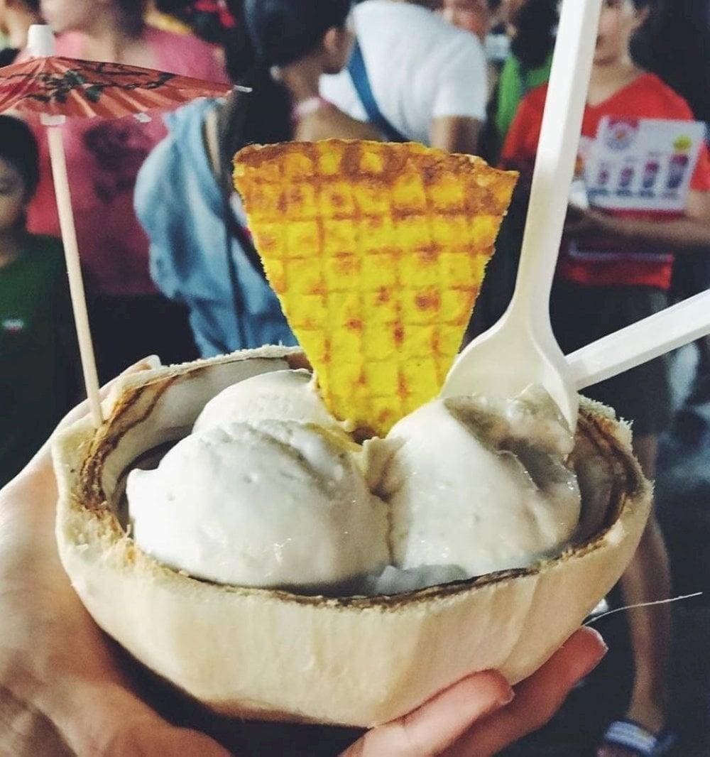 Cool down the heat with freshly served coconut ice cream